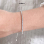 RADIANT SLIDER TENNIS BRACELET –  CRAFTED IN STERLING SILVER WITH TRIPLESHIELD™